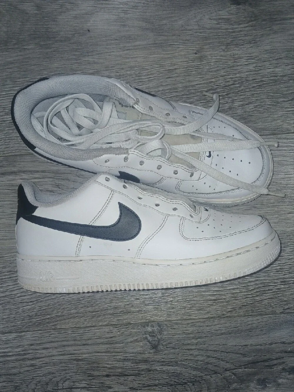 Nike Men’s White Sneakers with Black Swoosh